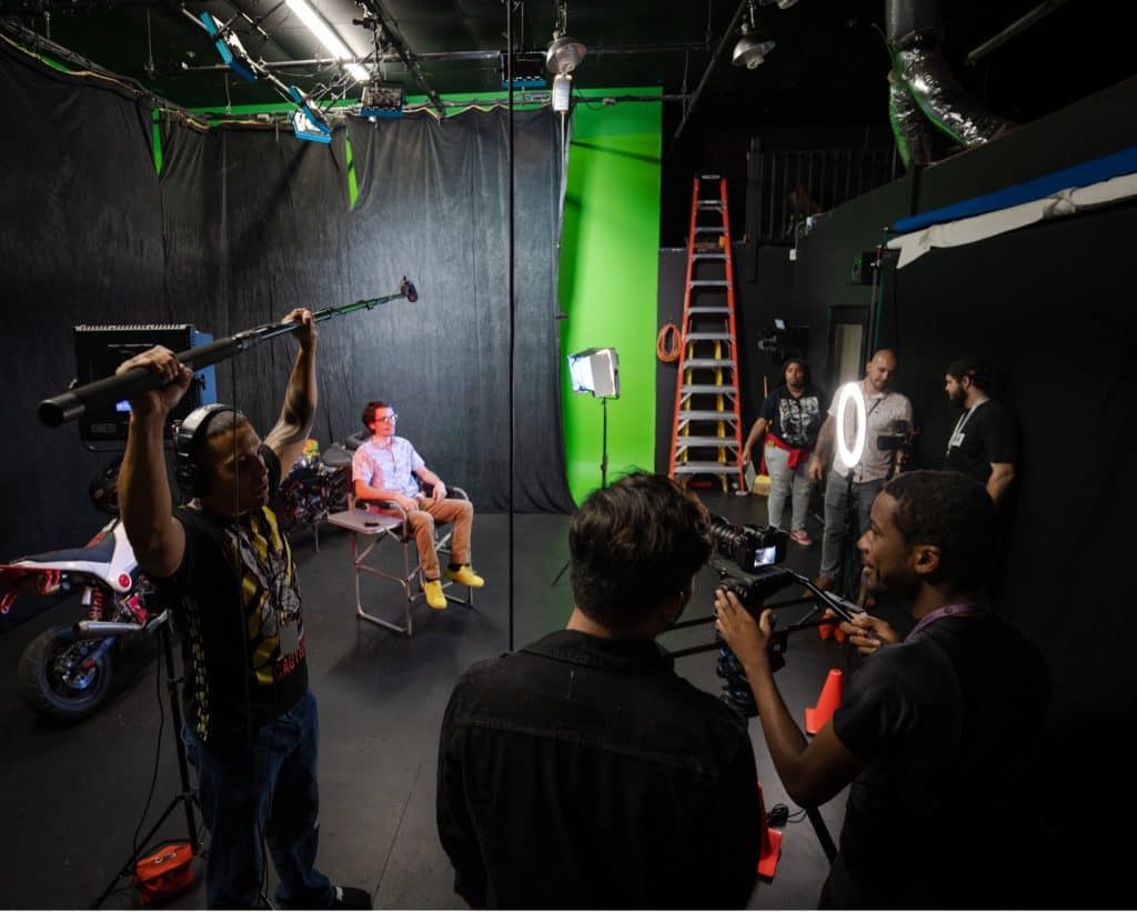 One of the many film crews you can find on set at F.I.R.S.T. Institute!