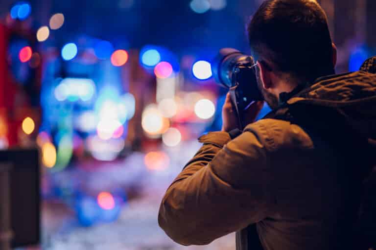 reporter photographer shooting in the city street 2022 03 29 07 09 53 utc