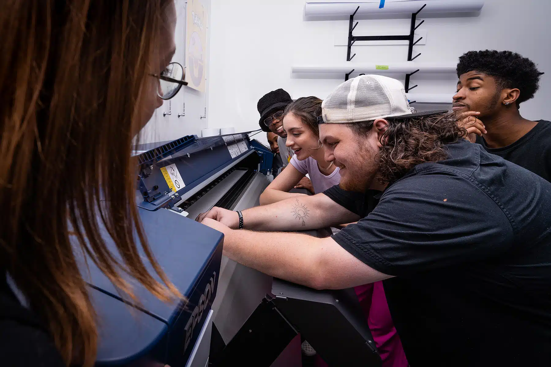 graphic design students in print shop