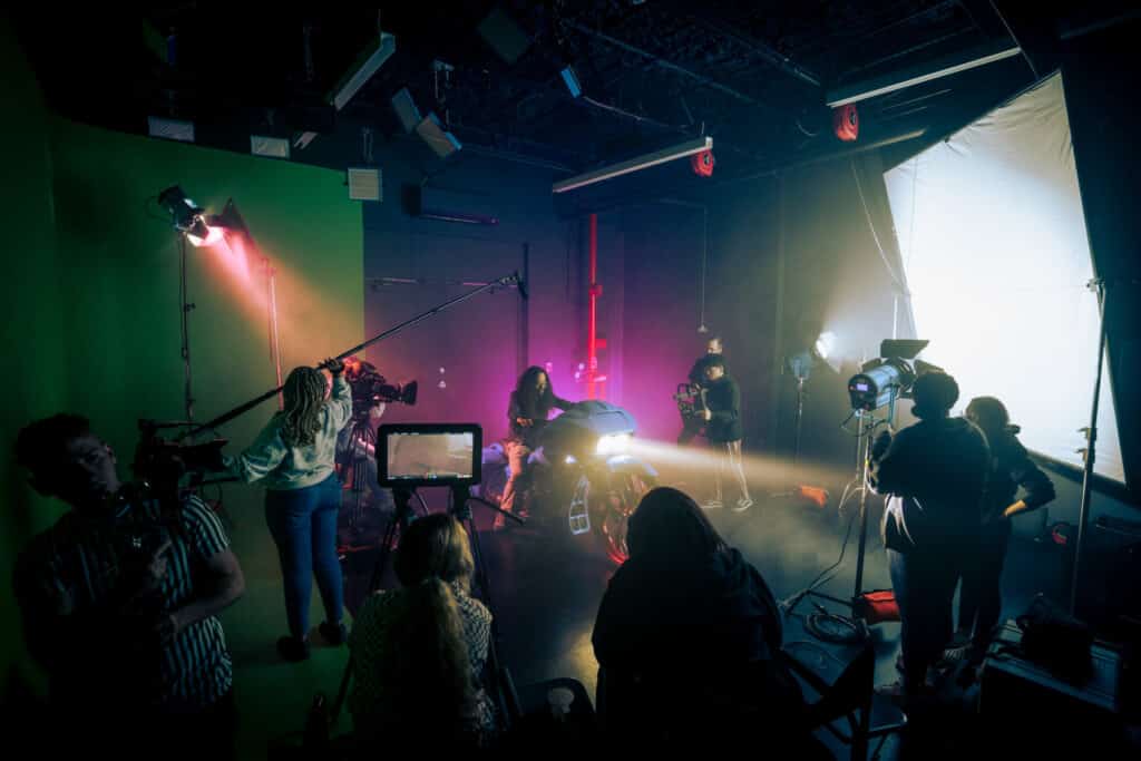 students learning to run a filmset