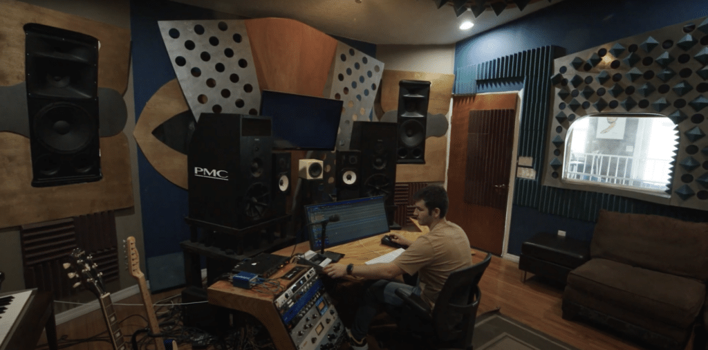 Recording arts graduate in studio