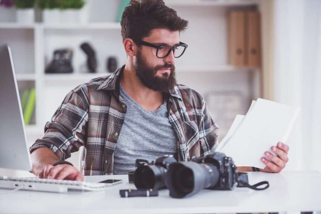 Photographer at his desk